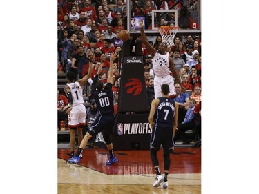 Toronto Raptors Serge Ibaka C (9) blocks a shot  during the fourth quarter in Toronto, Ont. on Wednesday April 24, 2019. Jack Boland/Toronto Sun/Postmedia Network