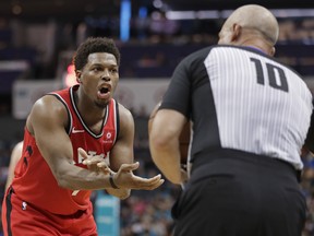 Toronto Raptors' Kyle Lowry, left, argues for a call with referee Ron Garretson (10) during the second half of the team's NBA basketball game against the Charlotte Hornets in Charlotte, N.C., Friday, April 5, 2019. (AP Photo)