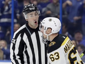 Boston Bruins forward Brad Marchand has tried to stay on the good side of officials and those in the NHL who hand out supplementary discipline this season. (CHRIS O'MEARA/AP)