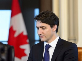 Prime Minister Justin Trudeau meets with Executive Chairman of Stelco Inc. Alan Kestenbaum in his office on Parliament Hill in Ottawa on Thursday, April 11, 2019. (THE CANADIAN PRESS/Sean Kilpatrick)