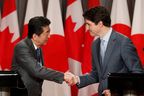 Japanese Prime Minister Shinzo Abe and Canadian Prime Minister Justin Trudeau take part in a welcoming ceremony on Parliament Hill in Ottawa on Sunday, April 28, 2019. (THE CANADIAN PRESS/ Patrick Doyle)