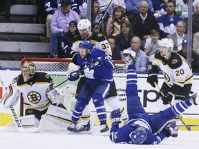 Patrick Marleau lands on his back as Connor Brown looks for a chance to score during the Maple Leafs game 4 against the Boston Bruins on Wednesday April 17, 2019 at Scotiabank Arena in Toronto. Veronica Henri/Toronto Sun