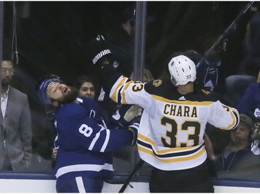 Toronto Maple Leafs defenseman Jake Muzzin (8) and Boston Bruins defenseman Zdeno Chara (33) on Sunday April 21, 2019 in Toronto. The Toronto Maple Leafs hosted the Boston Bruins in Game 6 of the best-of-7 Eastern Conference First Round at Scotiabank Arena Veronica Henri/Toronto Sun/Postmedia Network