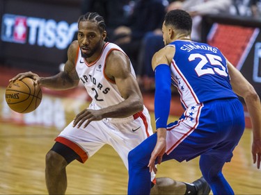 Toronto Raptors Kawhi Leonard and Philadelphia 76ers Ben Simmons during 1st half action at the Eastern Conference Semifinals at the Scotiabank Arena in in Toronto, Ont. on Monday April 29, 2019. Ernest Doroszuk/Toronto Sun/Postmedia