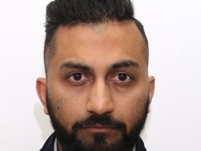 Uber driver Taneem Aziz, 36, of Mississauga, was arrested and charged with two counts of sexual assault. (Toronto Police handout)