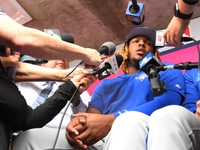 Blue Jays’ Vladimir Guerrero Jr. takes questions from reporters before last night’s game against the Angels at Angel Stadium in Anaheim. The 20-year-old, who was called up by the Jays last week, was making his American debut. (GETTY IMAGES)