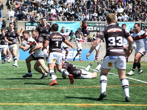 Toronto Wolfpack and Swinton Lions players square off at Lamport. (Submitted photo)