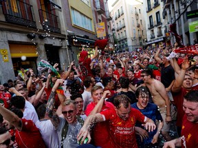 Tottenham and Liverpool fans arrive in Madrid ahead of Saturday's Champions League final. (REUTERS)