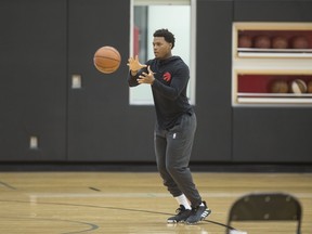 Toronto Raptors' Kyle Lowry gets passed the ball at the end of practice on Tuesday. (CRAIG ROBERTSON/Toronto Sun)