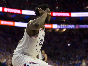 Philadelphia 76ers' Joel Embiid celebrates after a dunk during Thursday's win over Toronto. (GETTY IMAGES)