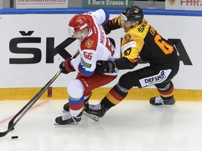 Russia's Ilya Mikheyev (left) signed with the Maple Leafs on Monday. (THE CANADIAN PRESS)