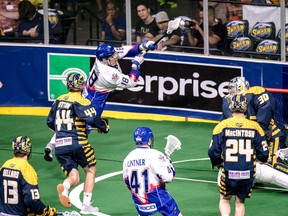 Toronto Rock's Johnny Powless takes a shot on Georgia Swarm goalie Mike Poulin during Monday's game. (KYLE HESS/Toronto Rock)