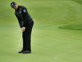 Corey Conners putts during a practice round prior to the 2019 PGA Championship at the Bethpage Black course on May 14, 2019 in Bethpage, New York. (Patrick Smith/Getty Images)