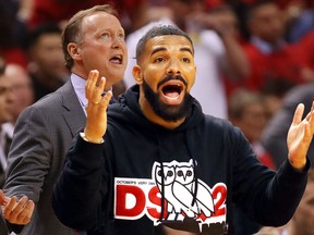 TORONTO, ONTARIO - MAY 21: Head coach Mike Budenholzer of the Milwaukee Bucks reacts during the first half in game four of the NBA Eastern Conference Finals against the Toronto Raptors at Scotiabank Arena on May 21, 2019 in Toronto, Canada. NOTE TO USER: User expressly acknowledges and agrees that, by downloading and or using this photograph, User is consenting to the terms and conditions of the Getty Images License Agreement. (Photo by Gregory Shamus/Getty Images)