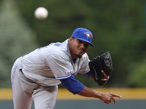 Blue Jays’ Edwin Jackson throws in the first inning against the Rockies in Denver last night.  
Getty Images