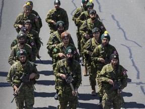 Members of the Canadian  Forces make their way along Lake Shore Blvd W. as a part of the Khalsa Day celebration on April 28, 2019. (Ernest Doroszuk,Toronto Sun)