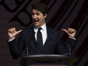 Prime Minister Justin Trudeau jokes during a speech at the annual Press Gallery dinner in Gatineau, Que., Saturday, May 4, 2019. (THE CANADIAN PRESS)