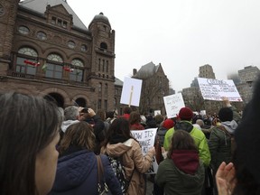 Various groups protest at a May Day rally at Queens Park on May 1, 2019. (Jack Boland, Toronto Sun)