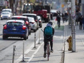 A cyclist in the bike lane along Bloor St. W., near Christie St. in Toronto, Ont. on Thursday May 9, 2019. Ernest Doroszuk/Toronto Sun