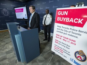 Toronto Mayor John Tory and Police Chief Mark Saunders announced a new gun buyback program on April 26, 2019. (Craig Robertson, Toronto Sun)