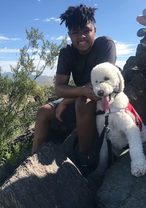 Reece Nicholson with guide dog Frodo. (Supplied photo)