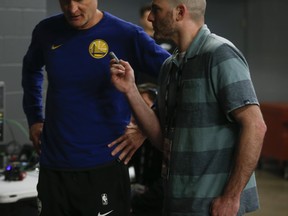 Toronto Sun's Ryan Wolstat speaks with Golden State Warriors head coach Steve Kerr at NBA Finals media day on Wednesday. (JACK BOLAND/Toronto Sun)