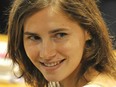 US Amanda Knox reacts in court before the start of a session of her appeal trial in Perugia's courthouse on July 25, 2011.