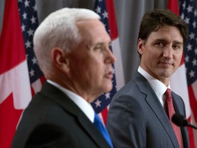 Prime Minister Justin Trudeau listens as U.S. Vice-President Mike Pence makes his opening statement during a joint news conference in Ottawa, Thursday, May 30, 2019. THE CANADIAN PRESS/Adrian Wyld