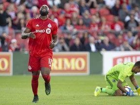 Toronto FC’s Jozy Altidore reacts after teammate Richie Laryea’s shot went wide of the goal last night against the San Jose Earthquakes at BMO Field. (The Canadian Press)