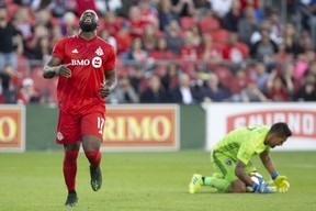 Toronto FC’s Jozy Altidore reacts after teammate Richie Laryea’s shot went wide of the goal last night against the San Jose Earthquakes at BMO Field. (The Canadian Press)