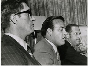 Then St. Louis Blues coach Al Arbour, left, and general manager Scotty Bowman, centre, are pictured on Sept. 11, 1970. Toronto Sun files