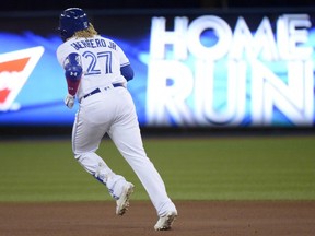 Toronto Blue Jays third baseman Vladimir Guerrero Jr. (27) rounds the bases after hitting his first home field home run during fourth inning American League MLB baseball action against the Boston Red Sox starting pitcher Rick Porcello in Toronto on Wednesday, May 22, 2019. THE CANADIAN PRESS/Nathan Denette