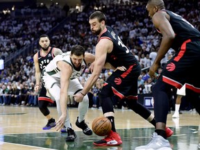 Toronto Raptors centre Marc Gasol (33) steals the ball from Milwaukee Bucks forward Nikola Mirotic (41) during first half NBA Eastern Conference finals playoff basketball action in Milwaukee on Wednesday, May 15, 2019. THE CANADIAN PRESS/Frank Gunn