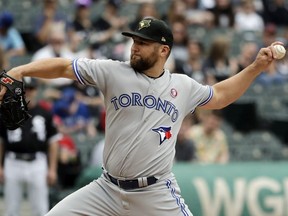 Toronto Blue Jays starting pitcher Ryan Feierabend throws against the Chicago White Sox during the first inning of a baseball game in Chicago, Saturday, May 18, 2019.