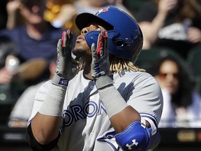 Toronto Blue Jays' Vladimir Guerrero Jr., celebrates as he rounds the bases after hitting a two-run home run during the eighth inning of a baseball game against the Chicago White Sox in Chicago, Sunday, May 19, 2019. (AP Photo/Nam Y. Huh)