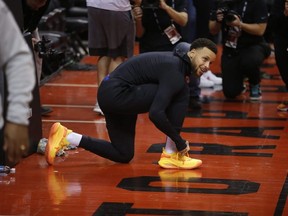 GOlden State Warriors star Steph Curry limbers up on Wednesday. JACK BOLAND/TORONTO SUN