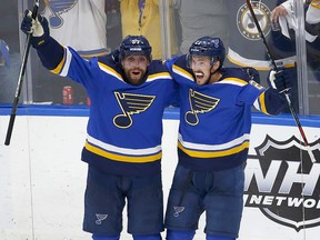 Tyler Bozak (right) of the St. Louis Blues celebrates with David Perron after scoring during Game 6 of the Western Conference Final at Enterprise Center on May 21, 2019 in St Louis, Missouri. (Dilip Vishwanat/Getty Images)
