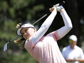 Brooke Henderson watches her tee shot on the second hole during the final round of the Pure Silk Championship golf tournament at Kingsmill Resort, in Williamsburg, Va., Sunday, May 26, 2019.