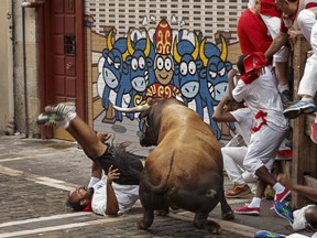 Not a good idea. Two men have been killed during bull-related events in Spain.  THE ASSOCIATED PRESS