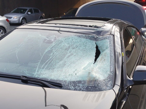 A flying tire smashed iinto a car's windshield on Hwy. 409 on Friday, May 31, 2019. (@OPP_HSD on Twitter)