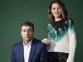 This May 19, 2019 photo shows Kyle Chandler, left, and Millie Bobby Brown posing for a portrait at the London Hotel in West Hollywood, Calif., to promote their new film "Godzilla: King of the Monsters." (Rebecca Cabage/Invision/AP)