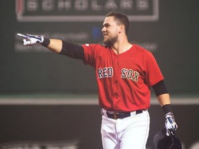 Michael Chavis of the Boston Red Sox reacts after hitting a walk off RBI single against the Colorado Rockies on May 15, 2019. (KATHRYN RILEY/Getty Images)
