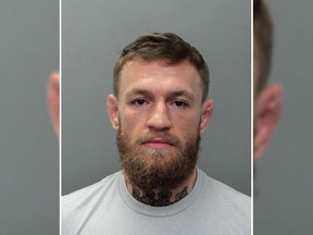 This photo provided by the Miami-Dade Corrections and Rehabilitation Department shows Conor McGregor. Authorities say mixed martial artist and boxer Conor McGregor has been arrested in South Florida for stealing the cellphone of someone who was trying to take his photo. A Miami Beach police report says the 30-year-old McGregor was arrested Monday, March 11, 2019 and charged with robbery and criminal mischief.
