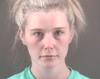 Teacher Sarah Melissa Wilson allegedly held onto a handgun for one of her students.