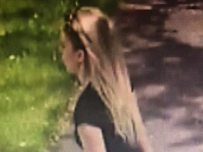 An image released by Toronto Police of a woman believed to have been the passenger on a Harley Davidson motorcycle that struck a boy on Victoria Park Ave. on May 26, 2019.