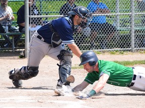 Maple Leafs catcher Justin Marra tags out a sliding Welland Jackfish baserunner in Sunday's IBL game at Christie Pits. Marra hit a three-run homer as the Leafs won 14-5. (MAX LEWIS PHOTO)