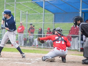 Maple Leafs’ designated Hitter Adam Marra checks his swing at the plate against the Hamilton Cardinals at Christie Pitts yesterday.  
Max Lewis/photo