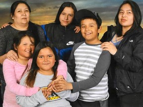 The attached handout photo is of members of the family affected by the Kitchenuhmaykoosib Inninuwug First Nation fatal fire on the morning of Thursday, May 2, 2019. Top row, left to right: victims Geraldine Chapman (mother), Angel McKay, 12, Karl Cutfeet, 9, and survivor Thyra Chapman, 19, who was out of town at the time of the blaze. Bottom row, left to right: victims Hailey Chapman, 7, and Shyra Chapman, 6.