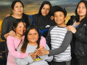 The attached handout photo is of members of the family affected by the Kitchenuhmaykoosib Inninuwug First Nation fatal fire on the morning of Thursday, May 2, 2019. Top row, left to right: victims Geraldine Chapman (mother), Angel McKay, 12, Karl Cutfeet (age nine), and survivor Thyra Chapman, 19, who was out of town at the time of the blaze. Bottom row, left to right: victims Hailey Chapman, 7, and Shyra Chapman, 6. (THE CANADIAN PRESS/HO-Office of the Chief and Council)