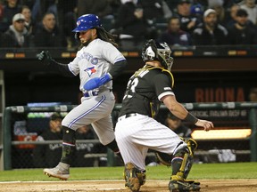 The Blue Jays’ Freddy Galvis scores on a throwing error during the third inning against the White Sox on Friday night at Guaranteed Rate Field in Chicago. Toronto scored four runs in the inning. (Nuccio DiNuzzo/Getty Images)